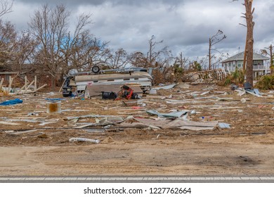 Mexico Beach, Florida, United States October 26, 2018.  16 Days After Hurricane Michael. Overturned Pontoon Boat & Trailer Near Canal Park.