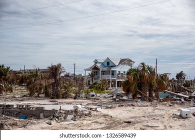 Mexico Beach, Florida, United States February 26, 2019. Blue House In Destroyed Neighborhood 5 Months After Hurricane Michael Hit Florida Gulf Coast Town.