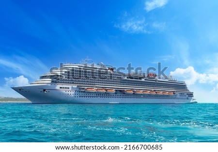 Mexico, Cabo San Lucas, Los Cabos vacation cruise ship near a beach and tourist destination El Arco.