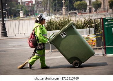 Mexico City, Mexico – April 09, 2020: Cleaning Crew In Mexico Wearing The Protective Gear Needed Due To Coronavirus Pandemia.