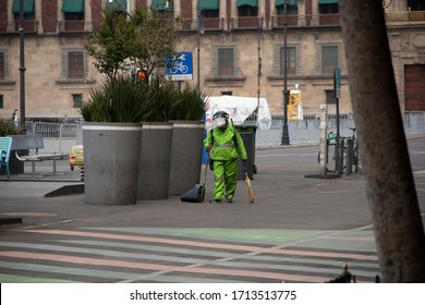 Mexico City, Mexico – April 09, 2020: Cleaning Crew In Mexico Wearing The Protective Gear Needed Due To Coronavirus Pandemia.