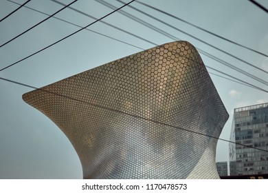 Mexico City, Mexico - August 22, 2018: The Soumaya Art Museum, Designed By Architect Fernando Romero, Under A Summer Blue Sky