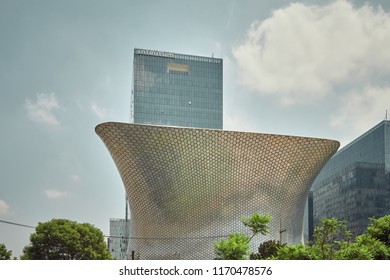 Mexico City, Mexico - August 22, 2018: The Soumaya Art Museum, Designed By Architect Fernando Romero, Under A Summer Blue Sky