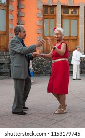 Mexico, City / Mexico - Ca. 2014: An Elderly Couple Dancing Danzon Music Outside The National Museum Of Popular Cultures In Coyoacan Downtown.