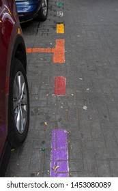 MEXICO CITY, CDMX / MEXICO - JUNE, 23, 2019: Parking Outlines In The Zona Rosa Section Of Mexico City Painted As The LGBTQ Flag.