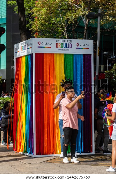 MEXICO CITY, CDMX / MEXICO - June 29, 2018:\
Parade cars and stands getting ready for the LGBTQ Pride Parade in\
Mexico City\'s Reforma\
Avenue.