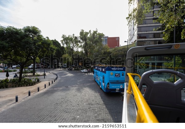 Mexico City, CDMX, Mexico,\
October 19, 2021, Convertible tourist bus parked at Cibelles\
square