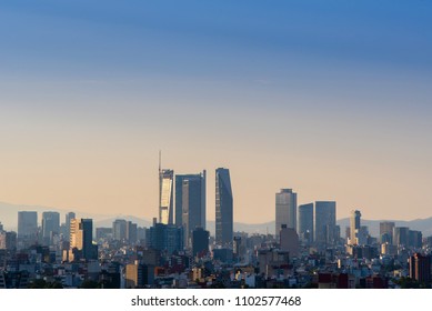 MEXICO CITY, MEXICO - CIRCA MAY 2018: Sunset at the city, panoramic view of main buildings and skyscrapers