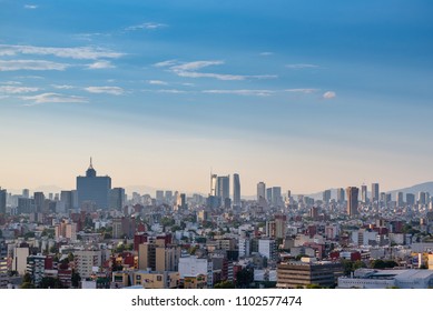 MEXICO CITY, MEXICO - CIRCA MAY 2018: Sunset at the city, panoramic view of main buildings and skyscrapers