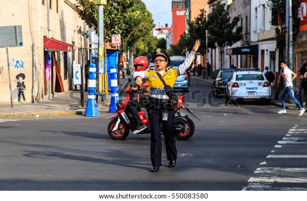 MEXICO CITY, MEXICO - DECEMBER 09, 2016 :
Traffic cop in the street of  Mexico
City