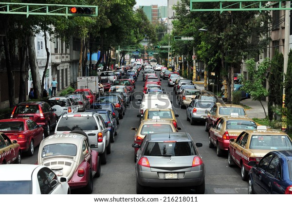 MEXICO CITY - FEB 24 2010:Traffic congestion in
Mexico City.In 2012, there were 23,550,000 registered motor
vehicles in Mexico.It's estimated that by 2018 there will be more
than 35,495,000
vehicles.