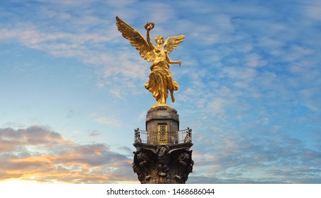 Mexico City/ Mexico - February 10, 2019: Monument of the Angel of Independence in the city of Mexico. a statue of an angel, made of gold