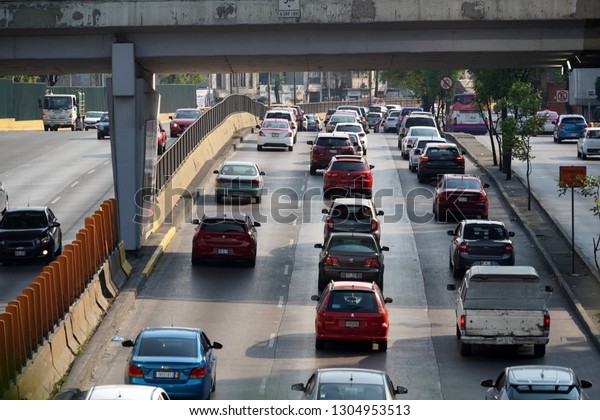 MEXICO CITY, MEXICO - FEBRUARY 3 2019 -\
Mexican metropolis with more than 25 milions of inhabitants mexico\
city street are every day a traffic\
jam