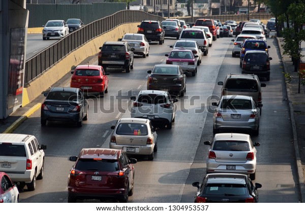 MEXICO CITY, MEXICO - FEBRUARY 3 2019 -\
Mexican metropolis with more than 25 milions of inhabitants mexico\
city street are every day a traffic\
jam