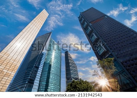Mexico City Financial Center buildings near Paseo Reforma and Angel of Independence column.