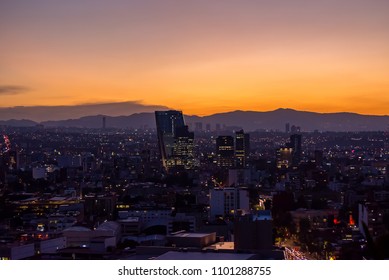Mexico City Golden Hour, buildings silhouettes, sunset