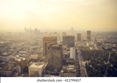 Mexico city industrial part covered in haze on sunset seen from the Latin American Tower, Mexico - Powered by Shutterstock