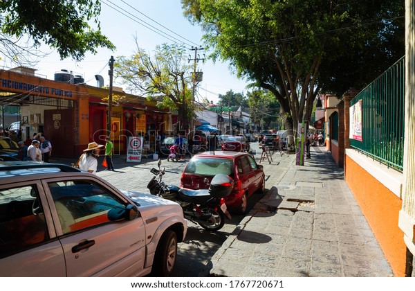 Mexico City /Mexico -\
January 12, 2020: Cars parked in Mexico City’s Coyoacán\
neighborhood.