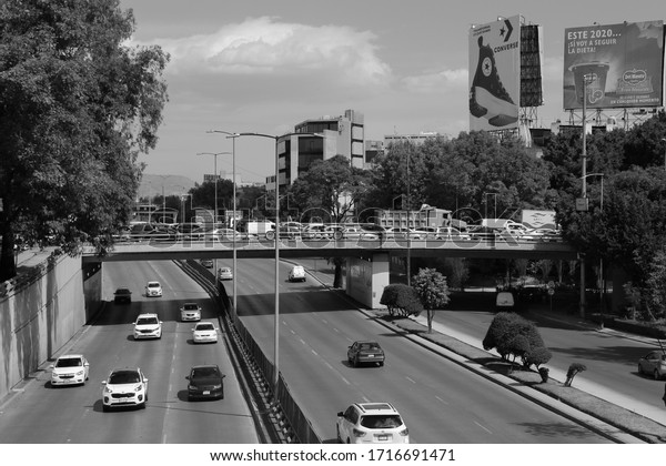 Mexico City, Mexico -\
January 31, 2020: Black and White Photograph of the Traffic in the\
Mexican Capital