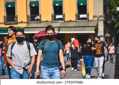 Mexico City, Mexico ; July 28 2020: People Walking In Downtown Mexico City Some With Face Masks And Some Not During The New Normal Post Covid 19