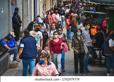 Mexico City, Mexico ; July 28 2020: People Walking In Downtown Mexico City Some With Face Masks And Some Not During The New Normal Post Covid 19