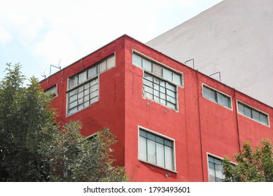 Mexico City, Mexico - July 31, 2020: Red Corner Building In The Neighborhood La Condesa