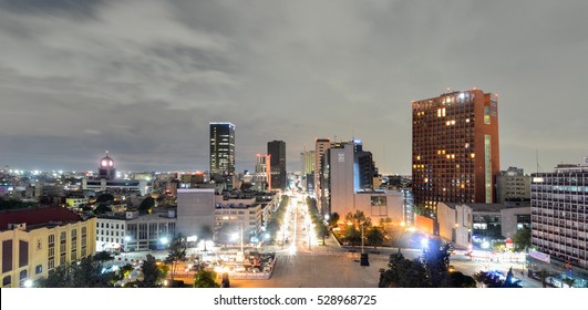 Mexico City, Mexico - July 5, 2016: Mexico City Skyline At Night From The Monument To The Mexican Revolution.