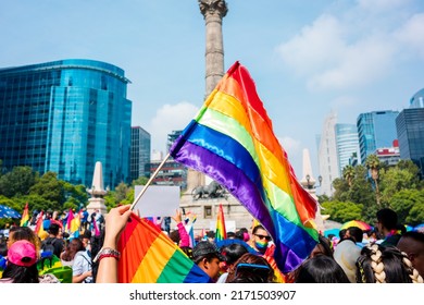 Mexico City, Mexico; June 25 2022: Hand Holding Pride Flag, Lgbt, Running.