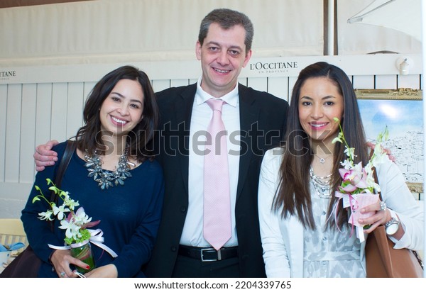 MEXICO CITY - March 18, 2014: Eric Maure, Senior Vice\
President of Sales and National Accounts of the L\'Occitane brand\
with some of the guests at the launch of the \