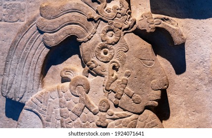 MEXICO CITY, MEXICO - MARCH 24, 2020: Bas relief carving in a stele tombstone of a mayan ruler king. Focus on nose and lips.
