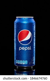 Mexico City, Mexico - May 5th, 2020: Blue can of Pepsi isolated on a black background. Drink