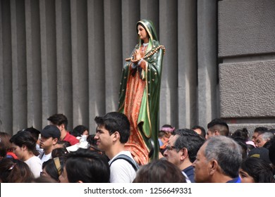 Mexico City, Mexico/Mexico--December 12, 2018. December 12th is the Virgin of Guadalupe Day and tens of thousands of people make pilgrimages to the Basilica in Mexico City. 