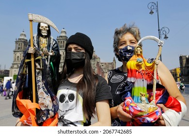 Mexico City, Mexico - November 1, 2021: People Carry An Image Of Our Lady Of The Holy Death Or La Santa Muerte, A Mexican Female Deity, In Zocalo Square, Downtown CDMX.