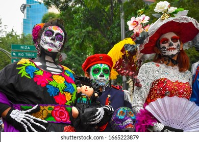 Mexico City, Mexico, ; October 26 2019: Portrait Of A Family In Disguise At The Day Of The Dead Parade In Mexico City