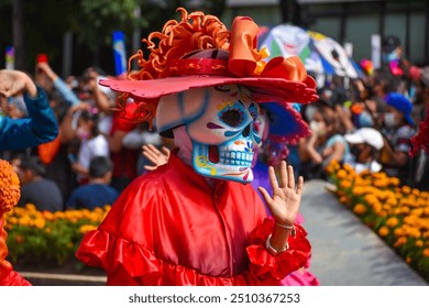 Mexico City, Mexico ; October 31 2021: Day of the dead parade in Mexico city, Catrinas with colorful costumes in an exciting tradition - Powered by Shutterstock