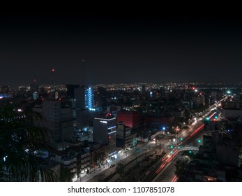 Mexico City From Rooftop At Night With Traffic Lights