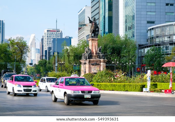 MEXICO\
CITY,MEXICO - DECEMBER 28,2016 : Street scene next to the Columbus\
Monument at Paseo de la Reforma in Mexico\
City