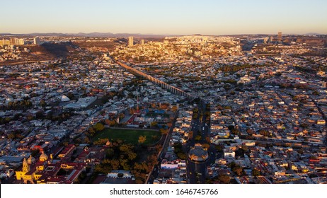 QUERÉTARO, MEXICO - FEBRUARY 9, 2020: Historical Aqueduct Of The City In An Aerial Photograph During Sunset