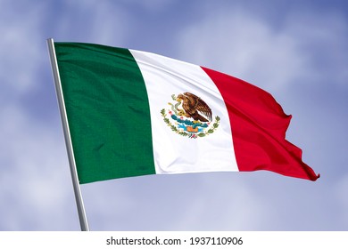 Mexico flag isolated on sky background. close up waving flag of Mexico. flag symbols of Mexico.