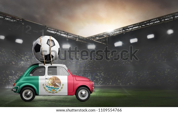 Mexico flag on car delivering soccer or football\
ball at stadium