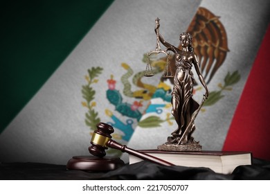 Mexico flag with statue of lady justice, constitution and judge hammer on black drapery. Concept of judgement and punishment - Shutterstock ID 2217050707