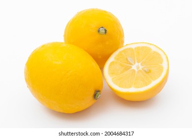 Meyer lemon on white background.