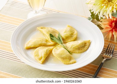 Mezzaluna : Fresh Ravioli Pasta Isolated On White Background. Half Moon Shape.