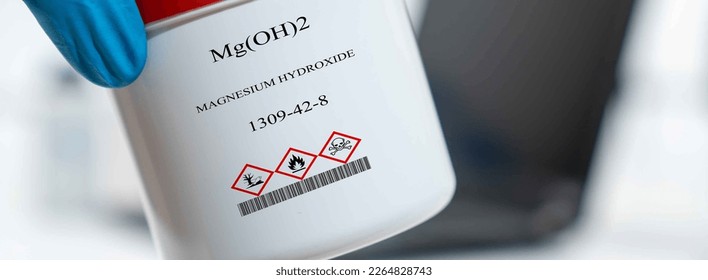 Mg(OH)2 magnesium hydroxide milk of magnesia CAS 1309-42-8 chemical substance in white plastic laboratory packaging