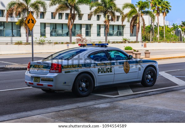 Miami Airport, Miami - March 04, 2018 - Police\
car in front of Miami\
Airport