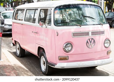 Miami Beach, FL, USA - 2020: Legendary Pink Car. Volkswagen Van Parked In A Sunny Street In The US. Retro Travel Jorney Life Style