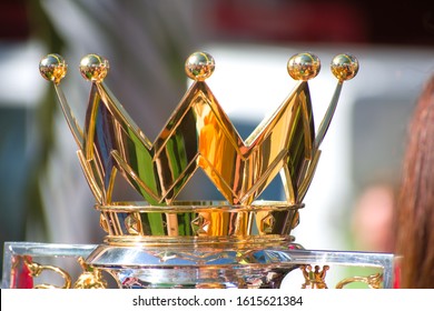 Miami Beach, FL, USA - December 15, 2019: Shiny, luxurious golden crown of English Premier Cup football/soccer trophy on display
