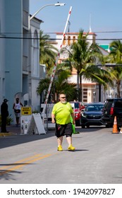 MIAMI BEACH, FL, USA - MARCH 20, 2021: Miami Beach Goodwill Ambassador Walking The Streets Assisting Tourists With Questions And Directions