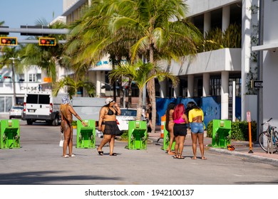 MIAMI BEACH, FL, USA - MARCH 20, 2021: Group Of Girlfriends On Spring Break Miami Beach FL