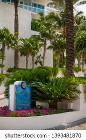 MIAMI BEACH, FL, USA - MAY 5, 2019: Entrance sign to Continuum Condominium Miami Beach with garden palm trees
